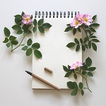 cahier avec rayon et fleurs